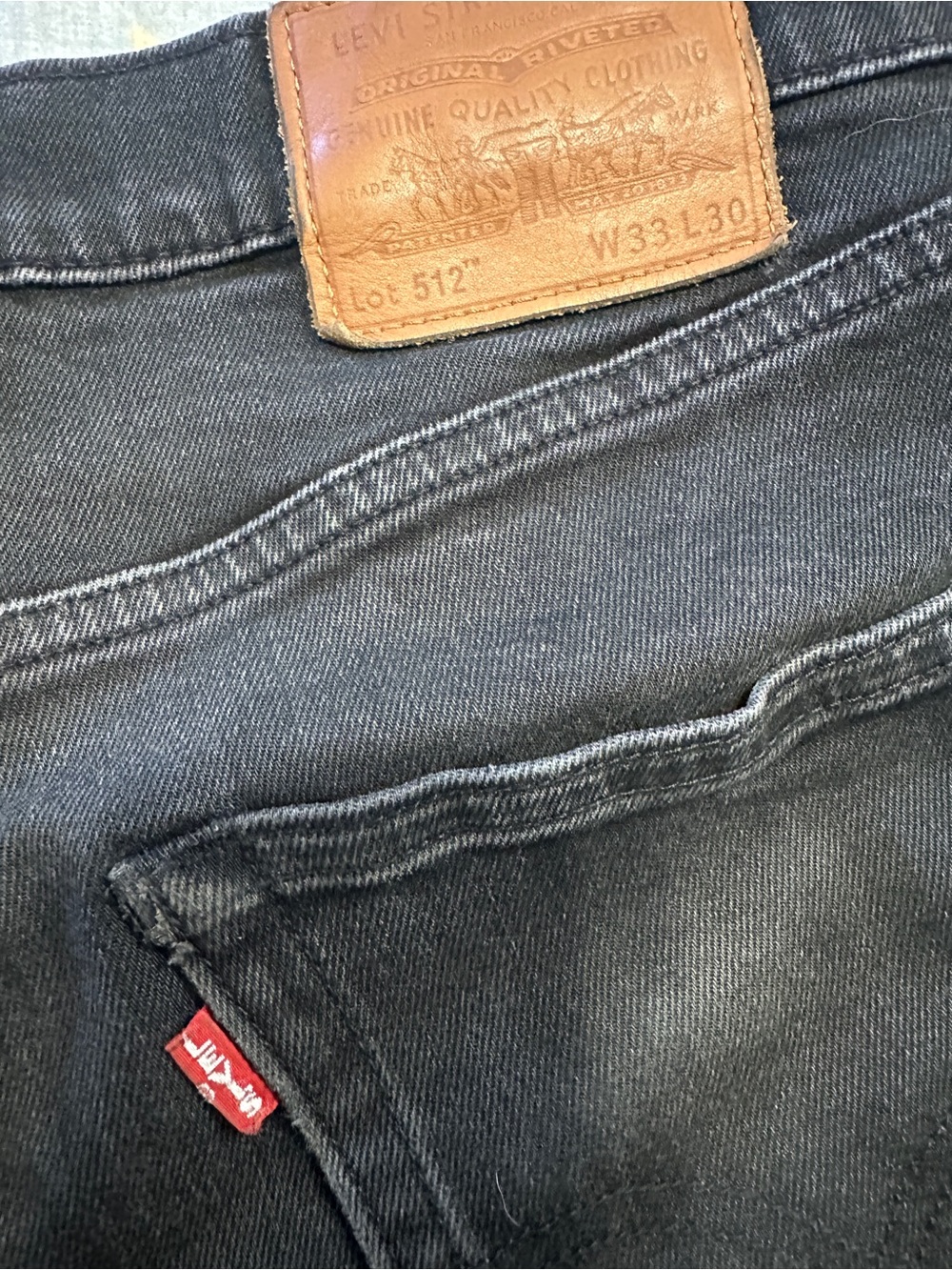 Levi's Men's Black Slim Straight Jeans with Brown Leather Patch